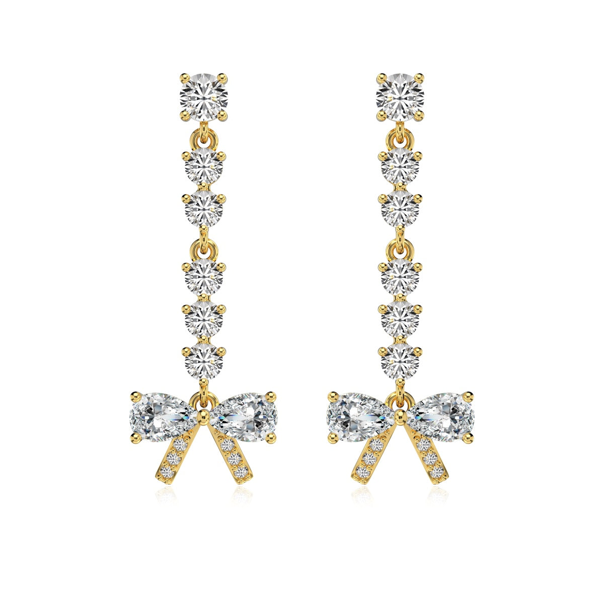 Gold and crystal bow-shaped earrings on a white background