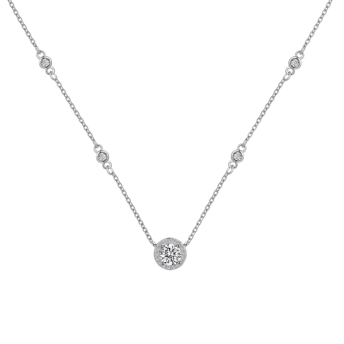 Silver necklace with a round pendant on a white background