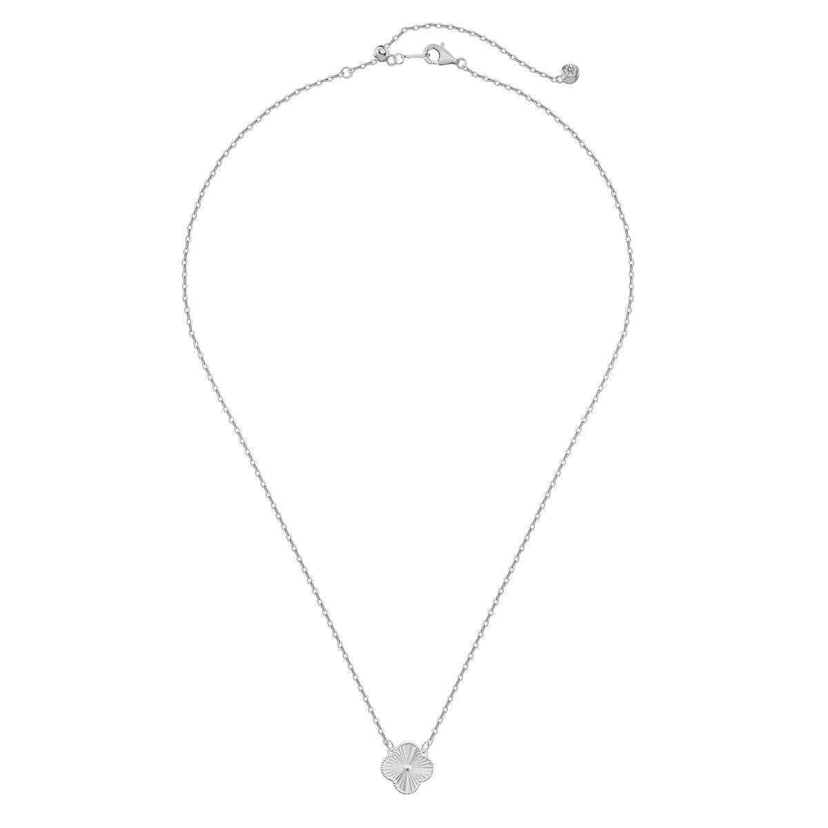 Silver necklace with a small four leaf clover pendant on a white background