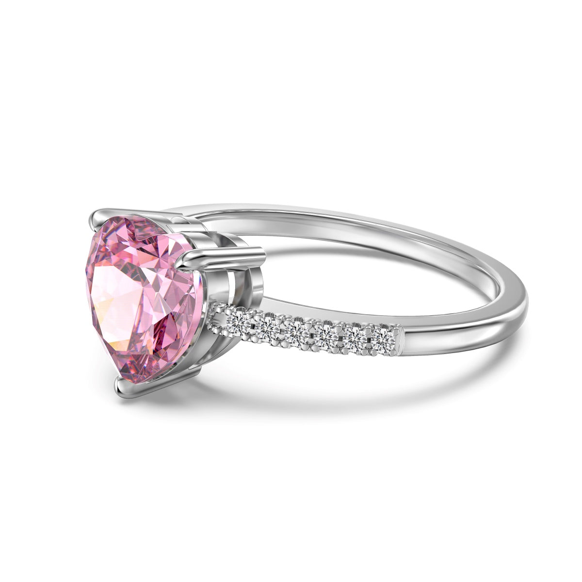 Silver ring with a pink gemstone on a white background