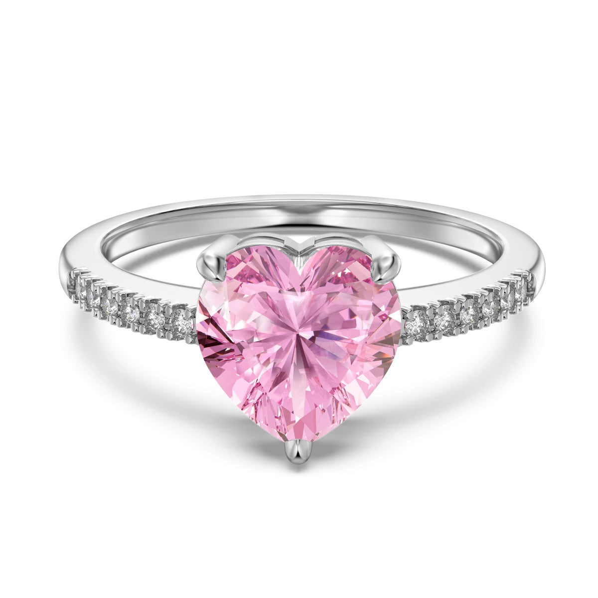 Silver ring with a heart-shaped pink gemstone on a white background