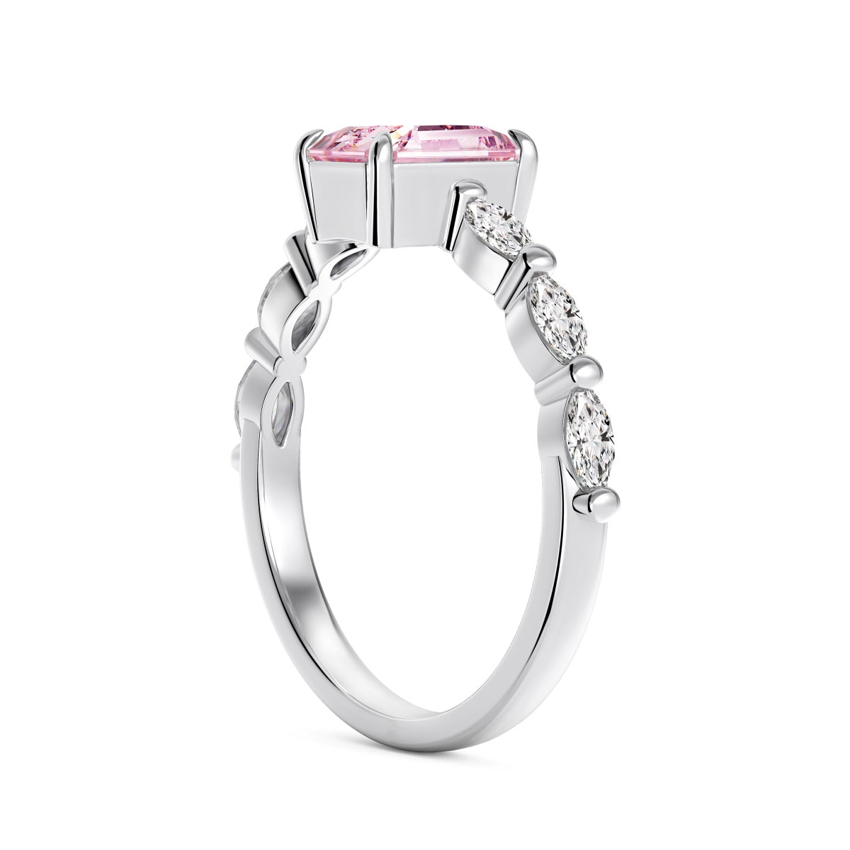 Silver ring with a pink gemstone on a white background