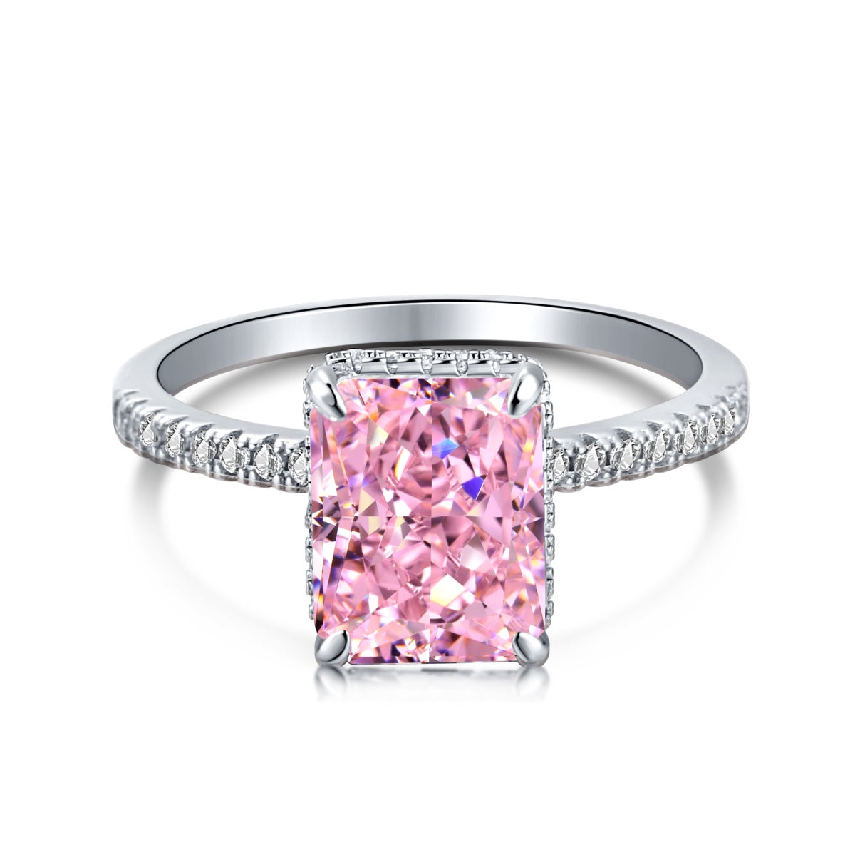Ring with a pink gemstone and silver band on a white background