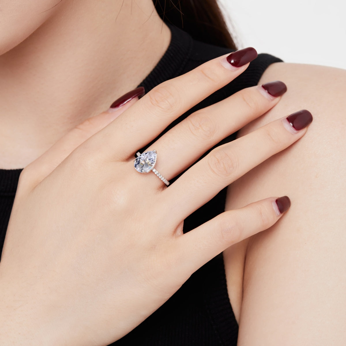 teardrop diamond ring on hand