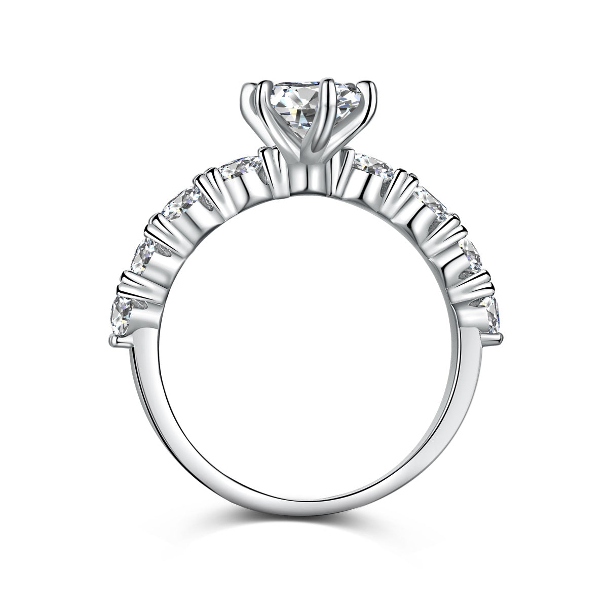 Silver ring with a marquise diamond on a white background