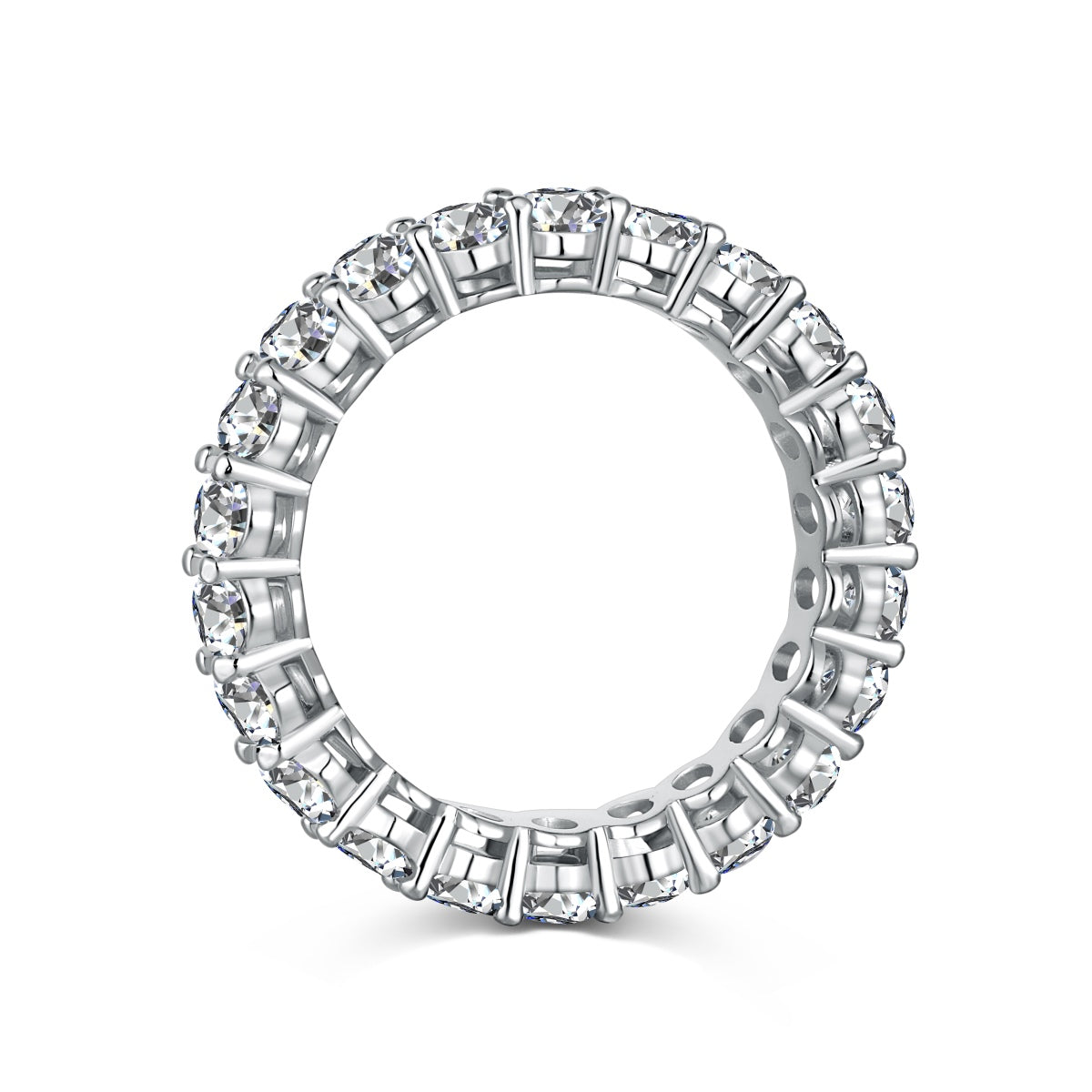 Diamond ring with baguette and round cut stones on a white background