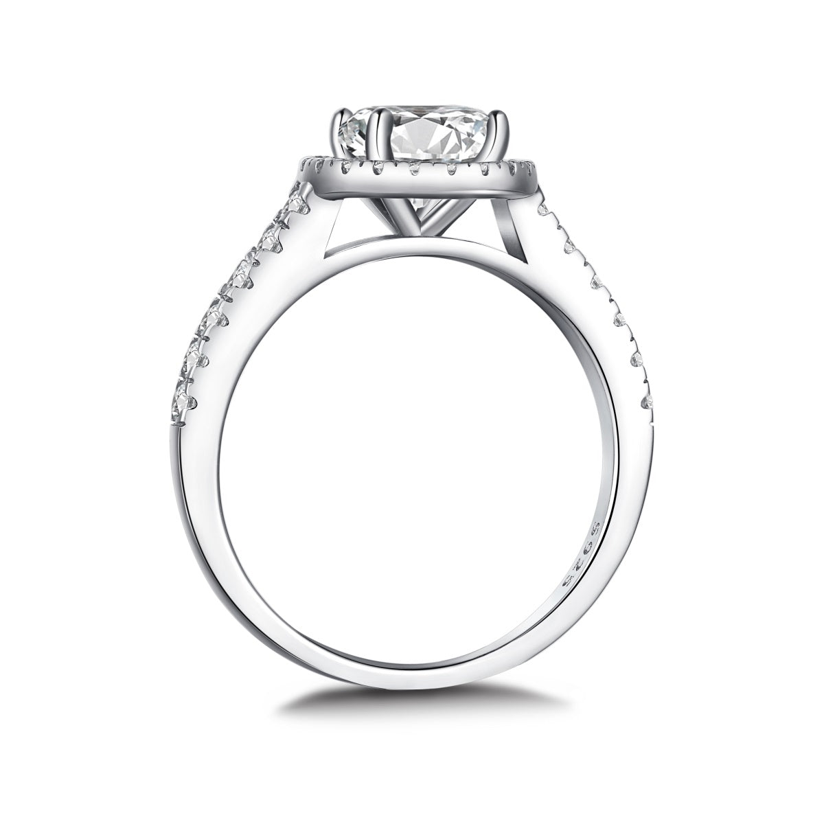 Silver ring with a diamond on a white background