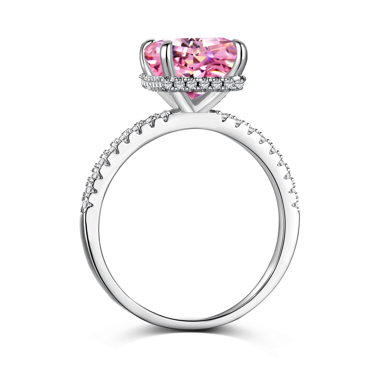 Silver ring with a pink heart-shaped gemstone on a white background