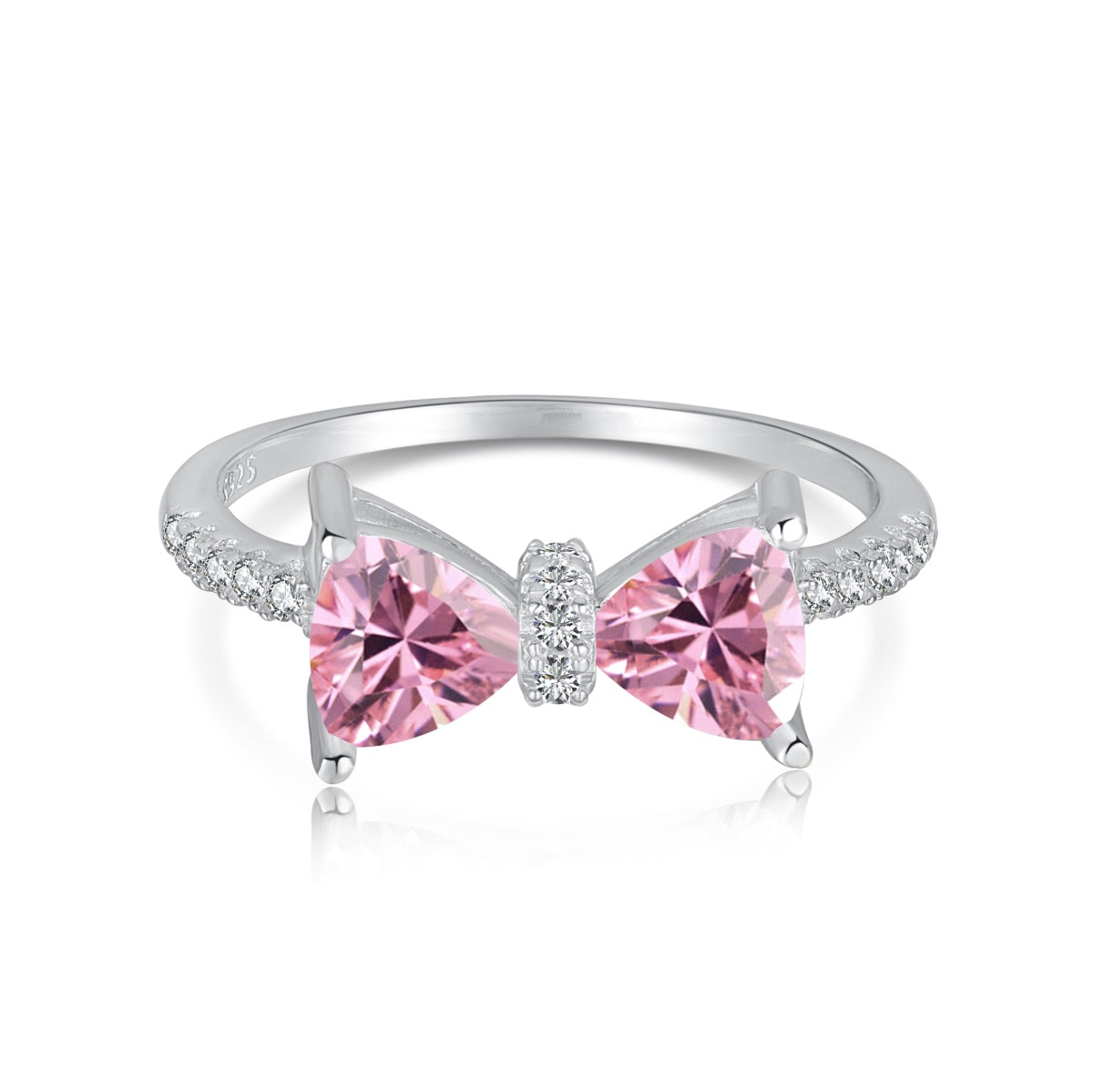 Silver ring with pink bow-shaped gemstones on a white background