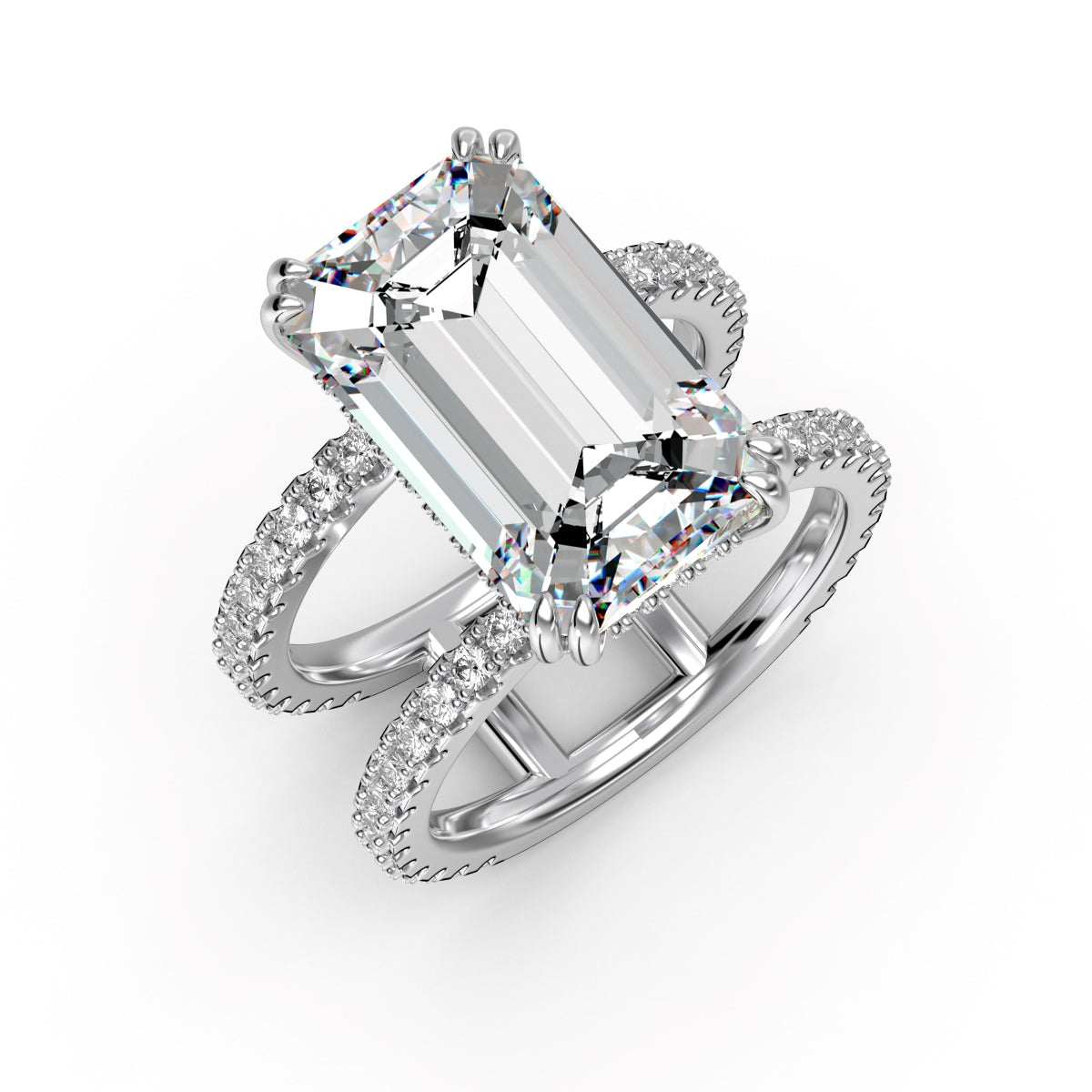Diamond ring with emerald-cut center stone on a white background